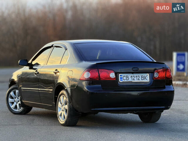 Черный Киа Маджентис, объемом двигателя 2 л и пробегом 305 тыс. км за 5400 $, фото 7 на Automoto.ua