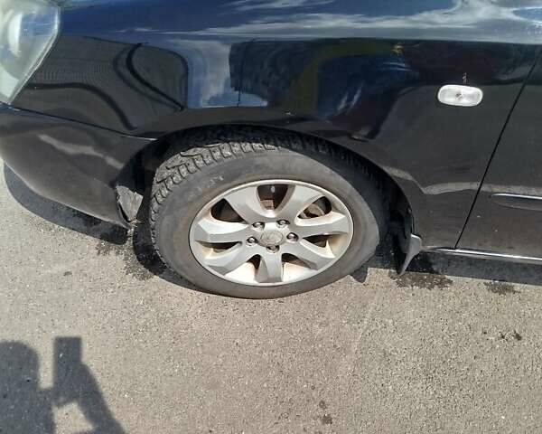 Черный Киа Маджентис, объемом двигателя 2 л и пробегом 265 тыс. км за 4800 $, фото 6 на Automoto.ua