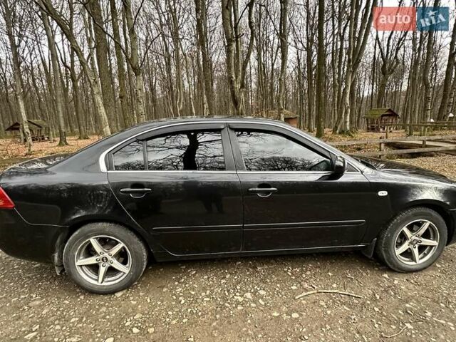 Чорний Кіа Маджентіс, об'ємом двигуна 2.66 л та пробігом 218 тис. км за 4600 $, фото 12 на Automoto.ua