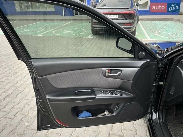 Чорний Кіа Маджентіс, об'ємом двигуна 2 л та пробігом 255 тис. км за 5700 $, фото 11 на Automoto.ua
