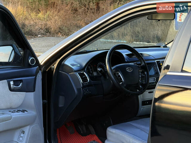 Черный Киа Маджентис, объемом двигателя 2 л и пробегом 305 тыс. км за 5400 $, фото 8 на Automoto.ua