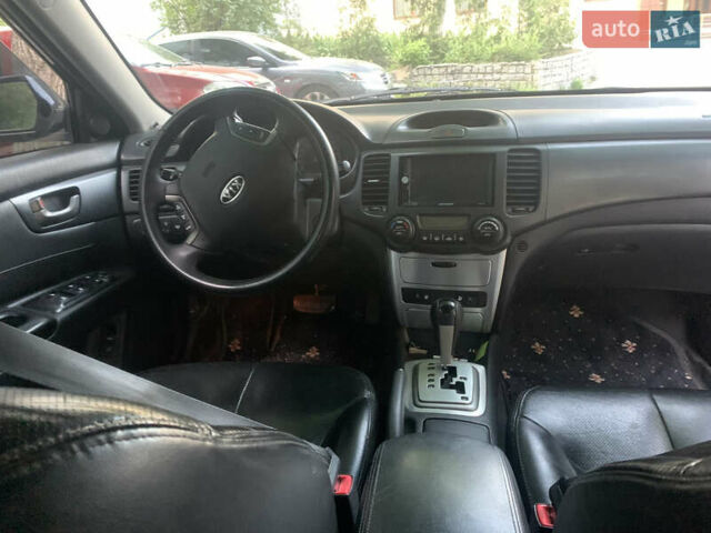 Черный Киа Маджентис, объемом двигателя 2 л и пробегом 272 тыс. км за 5300 $, фото 11 на Automoto.ua