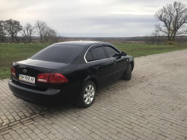 Кіа Маджентіс 2007 у Ромнах на Automoto.ua Чорний Кіа Маджентіс, об'ємом двигуна 2 л та пробігом 231 тис. км за 4900 $, фото 5 на Automoto.ua