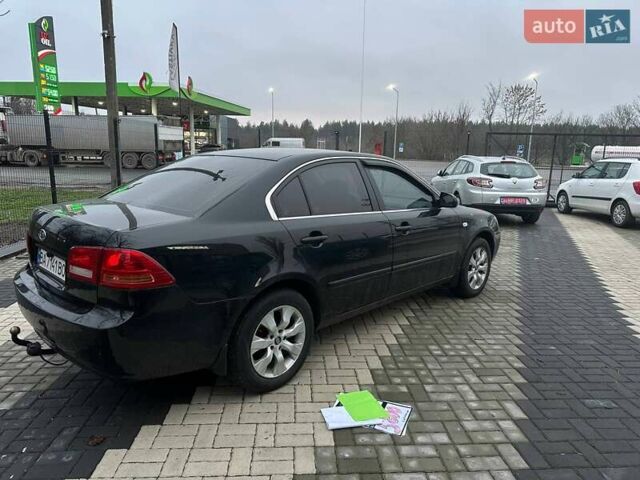 Чорний Кіа Маджентіс, об'ємом двигуна 2 л та пробігом 302 тис. км за 5800 $, фото 4 на Automoto.ua