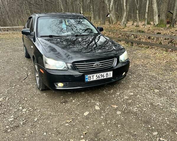 Чорний Кіа Маджентіс, об'ємом двигуна 2.66 л та пробігом 218 тис. км за 4600 $, фото 7 на Automoto.ua