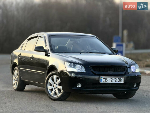 Черный Киа Маджентис, объемом двигателя 2 л и пробегом 305 тыс. км за 5400 $, фото 3 на Automoto.ua