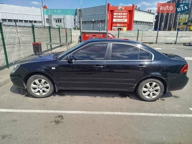 Черный Киа Маджентис, объемом двигателя 2 л и пробегом 265 тыс. км за 4800 $, фото 4 на Automoto.ua