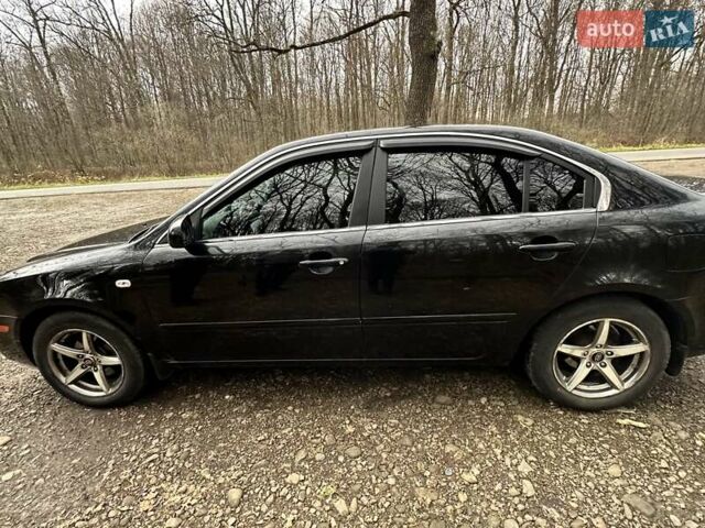 Чорний Кіа Маджентіс, об'ємом двигуна 2.66 л та пробігом 218 тис. км за 4600 $, фото 11 на Automoto.ua