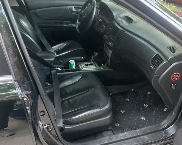 Черный Киа Маджентис, объемом двигателя 2 л и пробегом 272 тыс. км за 5300 $, фото 9 на Automoto.ua