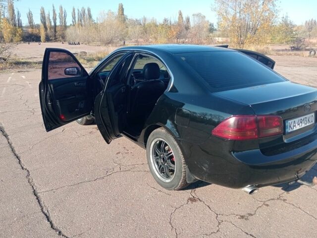 Чорний Кіа Маджентіс, об'ємом двигуна 2.7 л та пробігом 230 тис. км за 6000 $, фото 6 на Automoto.ua