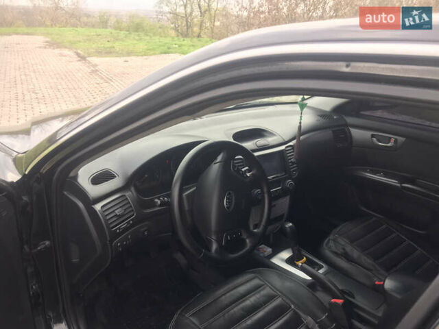 Кіа Маджентіс 2007 у Ромнах на Automoto.ua Чорний Кіа Маджентіс, об'ємом двигуна 2 л та пробігом 231 тис. км за 4900 $, фото 10 на Automoto.ua