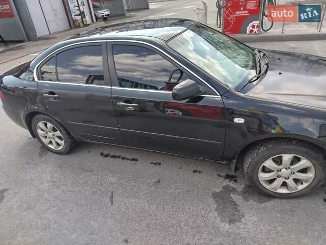 Черный Киа Маджентис, объемом двигателя 2 л и пробегом 265 тыс. км за 4800 $, фото 9 на Automoto.ua