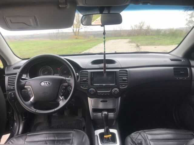 Кіа Маджентіс 2007 у Ромнах на Automoto.ua Чорний Кіа Маджентіс, об'ємом двигуна 2 л та пробігом 231 тис. км за 4900 $, фото 11 на Automoto.ua