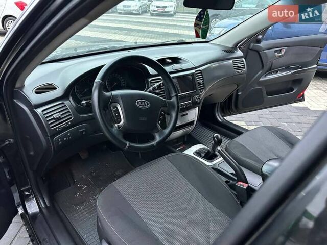 Чорний Кіа Маджентіс, об'ємом двигуна 2 л та пробігом 302 тис. км за 5800 $, фото 14 на Automoto.ua