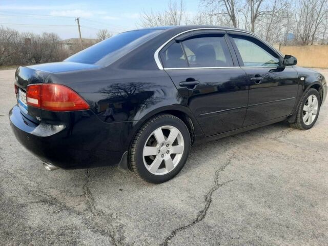 Чорний Кіа Маджентіс, об'ємом двигуна 2.7 л та пробігом 210 тис. км за 5300 $, фото 1 на Automoto.ua