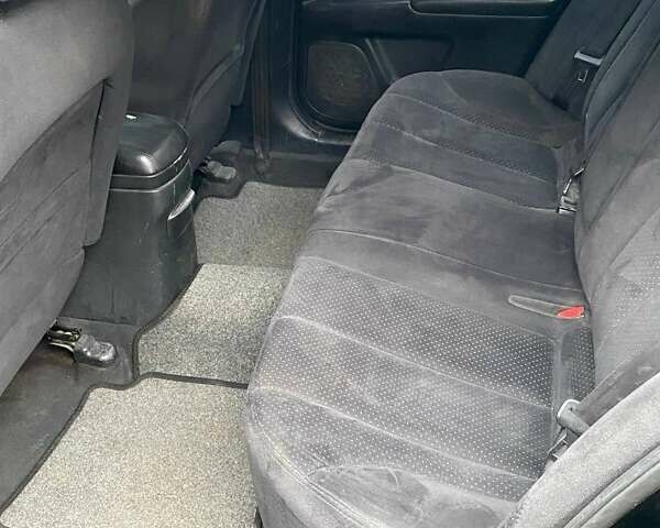 Чорний Кіа Маджентіс, об'ємом двигуна 2 л та пробігом 165 тис. км за 5200 $, фото 8 на Automoto.ua