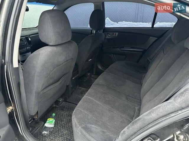 Черный Киа Маджентис, объемом двигателя 2 л и пробегом 270 тыс. км за 4200 $, фото 3 на Automoto.ua