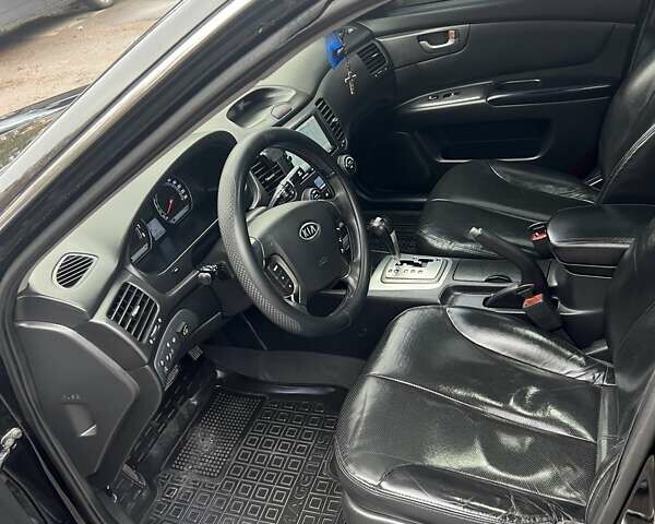 Черный Киа Маджентис, объемом двигателя 2 л и пробегом 258 тыс. км за 5500 $, фото 14 на Automoto.ua
