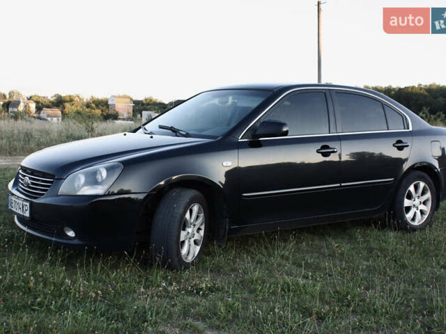 Чорний Кіа Маджентіс, об'ємом двигуна 2 л та пробігом 380 тис. км за 4600 $, фото 5 на Automoto.ua