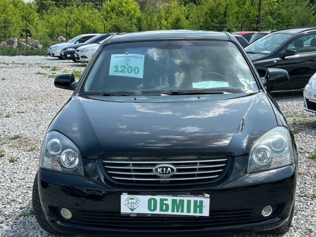 Черный Киа Маджентис, объемом двигателя 2 л и пробегом 273 тыс. км за 5100 $, фото 1 на Automoto.ua