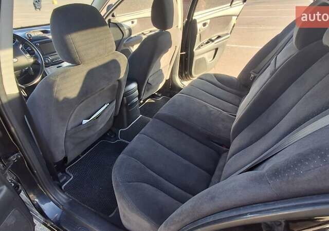 Чорний Кіа Маджентіс, об'ємом двигуна 2 л та пробігом 373 тис. км за 4500 $, фото 18 на Automoto.ua