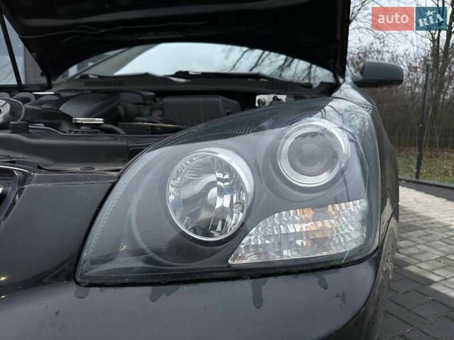 Чорний Кіа Маджентіс, об'ємом двигуна 2 л та пробігом 302 тис. км за 5800 $, фото 38 на Automoto.ua
