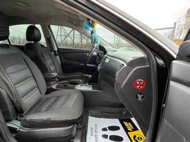 Черный Киа Маджентис, объемом двигателя 2.7 л и пробегом 219 тыс. км за 4600 $, фото 23 на Automoto.ua