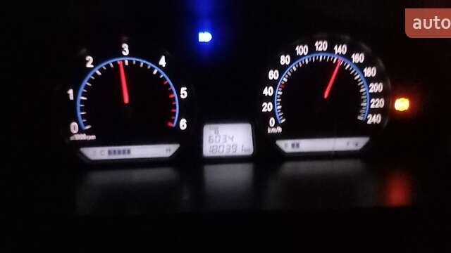 Черный Киа Маджентис, объемом двигателя 2 л и пробегом 180 тыс. км за 4900 $, фото 3 на Automoto.ua