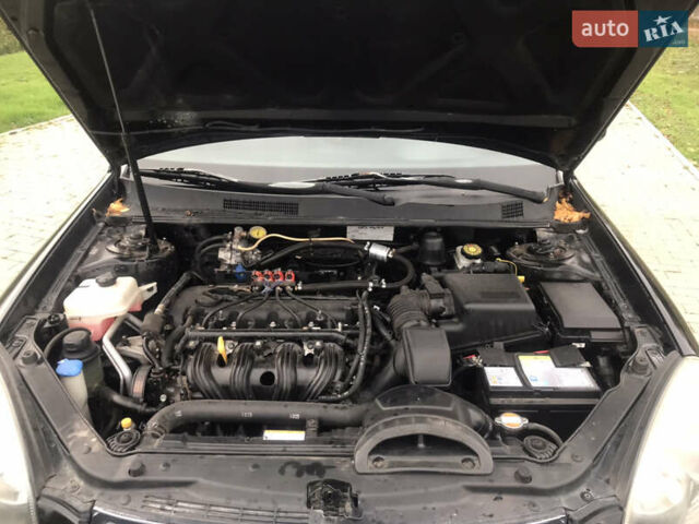 Кіа Маджентіс 2007 у Ромнах на Automoto.ua Чорний Кіа Маджентіс, об'ємом двигуна 2 л та пробігом 231 тис. км за 4900 $, фото 12 на Automoto.ua
