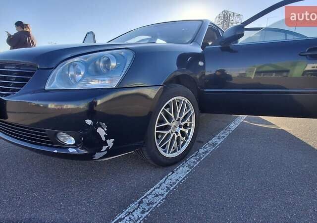 Чорний Кіа Маджентіс, об'ємом двигуна 2 л та пробігом 373 тис. км за 4500 $, фото 19 на Automoto.ua