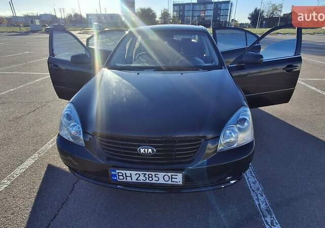 Чорний Кіа Маджентіс, об'ємом двигуна 2 л та пробігом 373 тис. км за 4500 $, фото 16 на Automoto.ua