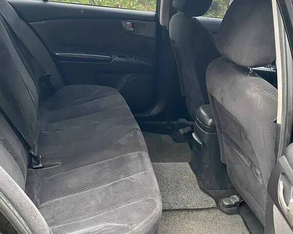 Чорний Кіа Маджентіс, об'ємом двигуна 2 л та пробігом 165 тис. км за 5200 $, фото 6 на Automoto.ua