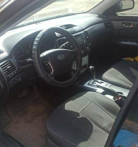 Черный Киа Маджентис, объемом двигателя 2 л и пробегом 322 тыс. км за 5000 $, фото 3 на Automoto.ua