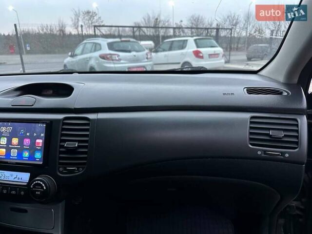 Чорний Кіа Маджентіс, об'ємом двигуна 2 л та пробігом 302 тис. км за 5800 $, фото 26 на Automoto.ua