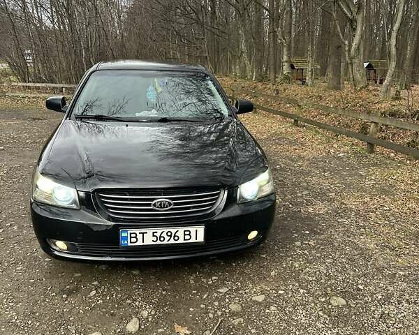Чорний Кіа Маджентіс, об'ємом двигуна 2.66 л та пробігом 218 тис. км за 4600 $, фото 6 на Automoto.ua