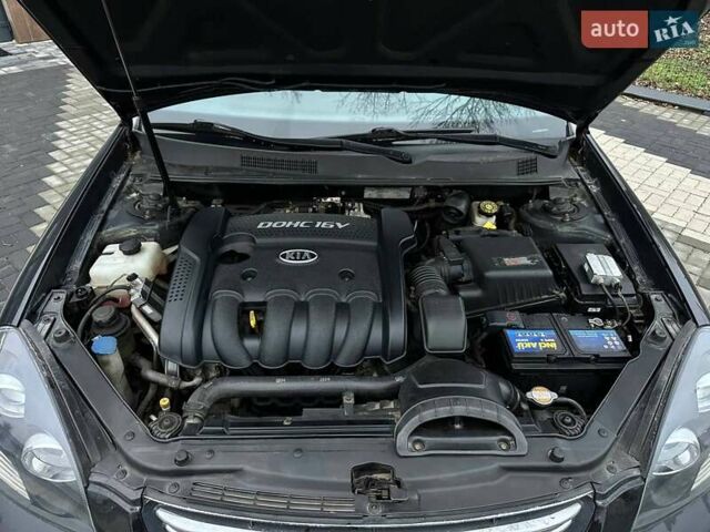 Чорний Кіа Маджентіс, об'ємом двигуна 2 л та пробігом 302 тис. км за 5800 $, фото 37 на Automoto.ua