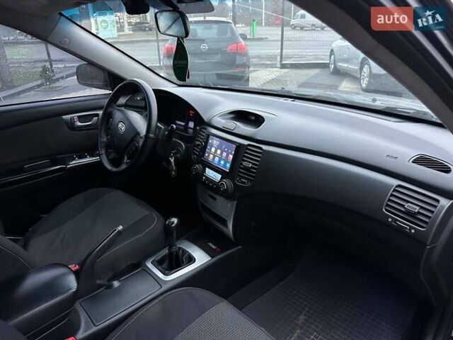 Чорний Кіа Маджентіс, об'ємом двигуна 2 л та пробігом 302 тис. км за 5800 $, фото 28 на Automoto.ua