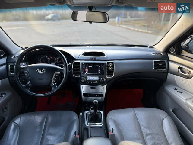 Черный Киа Маджентис, объемом двигателя 2 л и пробегом 305 тыс. км за 5400 $, фото 10 на Automoto.ua