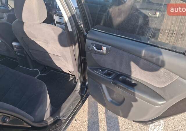 Чорний Кіа Маджентіс, об'ємом двигуна 2 л та пробігом 373 тис. км за 4500 $, фото 20 на Automoto.ua