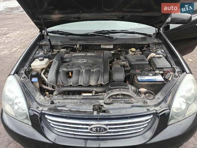 Черный Киа Маджентис, объемом двигателя 2 л и пробегом 322 тыс. км за 5000 $, фото 8 на Automoto.ua