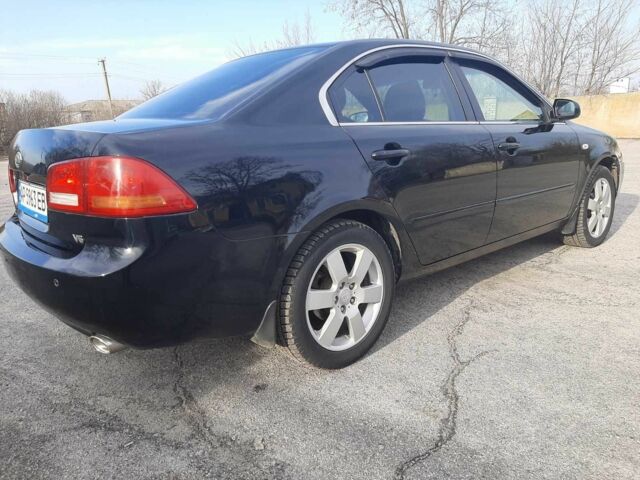 Чорний Кіа Маджентіс, об'ємом двигуна 2.7 л та пробігом 210 тис. км за 5300 $, фото 6 на Automoto.ua