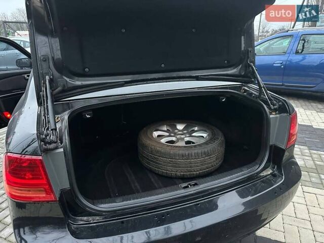 Чорний Кіа Маджентіс, об'ємом двигуна 2 л та пробігом 302 тис. км за 5800 $, фото 43 на Automoto.ua