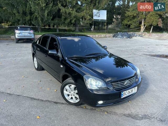 Черный Киа Маджентис, объемом двигателя 2 л и пробегом 258 тыс. км за 5500 $, фото 25 на Automoto.ua