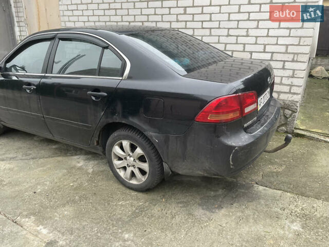 Черный Киа Маджентис, объемом двигателя 2 л и пробегом 366 тыс. км за 4000 $, фото 2 на Automoto.ua