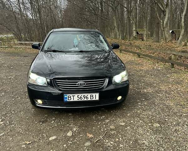 Чорний Кіа Маджентіс, об'ємом двигуна 2.66 л та пробігом 218 тис. км за 4600 $, фото 4 на Automoto.ua