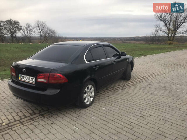 Кіа Маджентіс 2007 у Ромнах на Automoto.ua Чорний Кіа Маджентіс, об'ємом двигуна 2 л та пробігом 231 тис. км за 4900 $, фото 5 на Automoto.ua