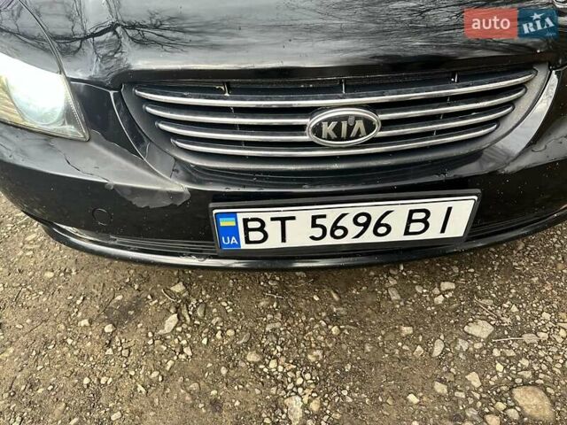 Чорний Кіа Маджентіс, об'ємом двигуна 2.66 л та пробігом 218 тис. км за 4600 $, фото 1 на Automoto.ua