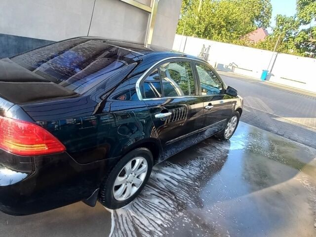 Черный Киа Маджентис, объемом двигателя 2 л и пробегом 180 тыс. км за 4800 $, фото 1 на Automoto.ua