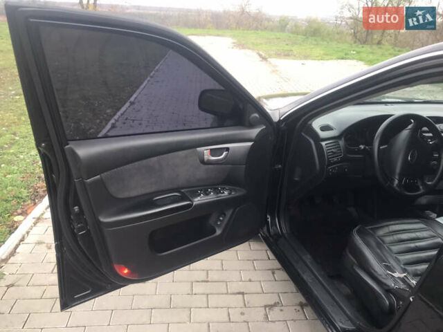 Кіа Маджентіс 2007 у Ромнах на Automoto.ua Чорний Кіа Маджентіс, об'ємом двигуна 2 л та пробігом 231 тис. км за 4900 $, фото 7 на Automoto.ua