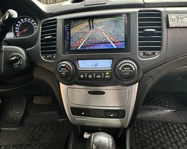 Чорний Кіа Маджентіс, об'ємом двигуна 2.66 л та пробігом 218 тис. км за 4600 $, фото 21 на Automoto.ua